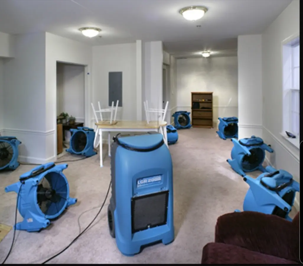 Air movers and dehumidifier setup for Water Damage Restoration in Champaign